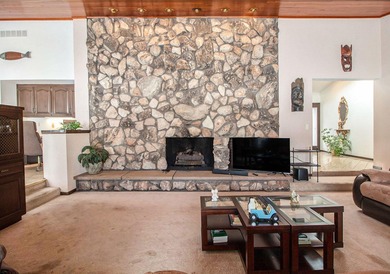 Sprawling brick ranch on a quiet culdesac overlooking the #11 on Travis Pointe Country Club in Michigan - for sale on GolfHomes.com, golf home, golf lot