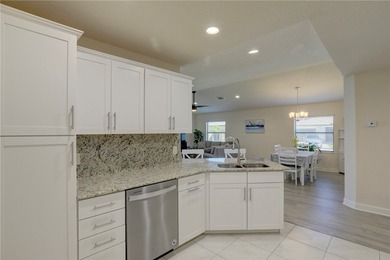 Easy Life. Lasting Style. Nearly new concrete block home in a on Spanish Lakes Country Club in Florida - for sale on GolfHomes.com, golf home, golf lot