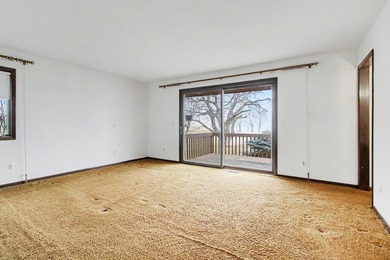 Situated on the prestigious Travis Pointe Golf Course on the on Travis Pointe Country Club in Michigan - for sale on GolfHomes.com, golf home, golf lot