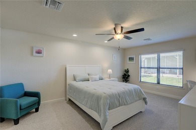 Easy Life. Lasting Style. Nearly new concrete block home in a on Spanish Lakes Country Club in Florida - for sale on GolfHomes.com, golf home, golf lot