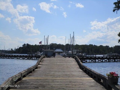 This .44 acre lot located on the golf course with trees in on Sound Golf Links at Albemarle Plantation in North Carolina - for sale on GolfHomes.com, golf home, golf lot
