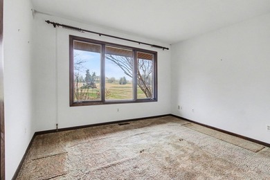 Situated on the prestigious Travis Pointe Golf Course on the on Travis Pointe Country Club in Michigan - for sale on GolfHomes.com, golf home, golf lot