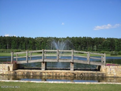 This lot is located in Albemarle Plantation at the 5th green and on Sound Golf Links at Albemarle Plantation in North Carolina - for sale on GolfHomes.com, golf home, golf lot
