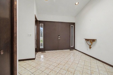 Situated on the prestigious Travis Pointe Golf Course on the on Travis Pointe Country Club in Michigan - for sale on GolfHomes.com, golf home, golf lot