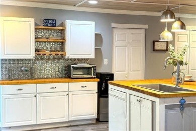 Welcome to this beautifully maintained 2-bedroom, 2 full bath on Piankatank River Golf Club in Virginia - for sale on GolfHomes.com, golf home, golf lot