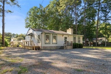 Welcome to this beautifully maintained 2-bedroom, 2 full bath on Piankatank River Golf Club in Virginia - for sale on GolfHomes.com, golf home, golf lot
