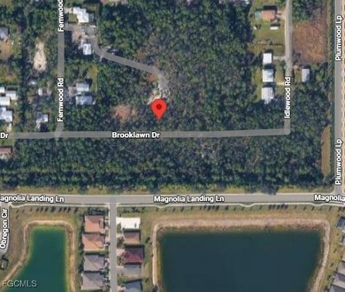 Discover the perfect opportunity to build your dream home on on Herons Glen Golf and Country Club in Florida - for sale on GolfHomes.com, golf home, golf lot
