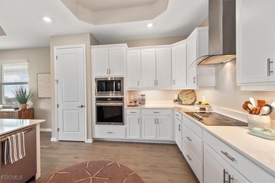 Golf membership included with this better than new single-family on Panther Run Golf Club in Florida - for sale on GolfHomes.com, golf home, golf lot