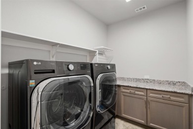 Located in the highly desirable 55+ gated community of Robson on Wildhorse Golf Club of Robson Ranch in Texas - for sale on GolfHomes.com, golf home, golf lot