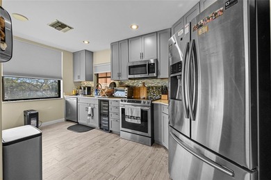 Wake up to sweeping golf course & sparkling lake views from this on Boca Pointe Country Club in Florida - for sale on GolfHomes.com, golf home, golf lot