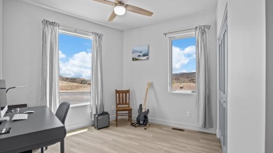 Welcome to your dream home in the highly sought-after Redlands on The Golf Club At Redlands Mesa in Colorado - for sale on GolfHomes.com, golf home, golf lot