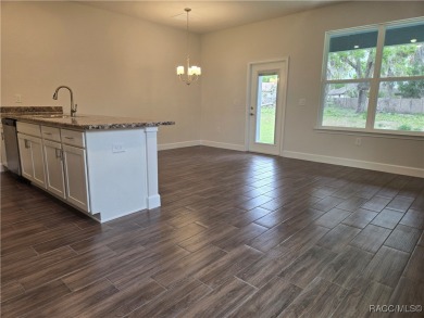 THE BLUE HERON TOWNHOUSE - Located in * The Premier Lakeside on Inverness Golf and Country Club in Florida - for sale on GolfHomes.com, golf home, golf lot