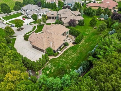 This fabulous custom home built by Starr Homes sits nestled on a on Nicklaus Golf Club At LionsGate in Kansas - for sale on GolfHomes.com, golf home, golf lot
