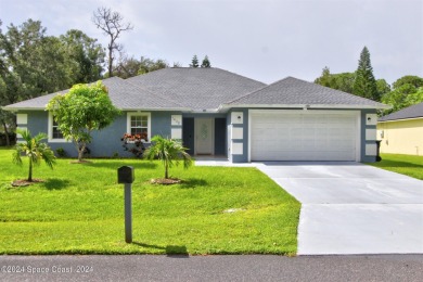 Solid built CBS construction home in great location. Open Floor on Majors Golf Club At Bayside Lakes in Florida - for sale on GolfHomes.com, golf home, golf lot