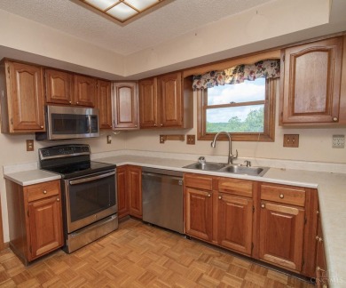 This spacious 2 story brick home boasts large rooms and plenty on Fairfield Greens-North Trace in Ohio - for sale on GolfHomes.com, golf home, golf lot
