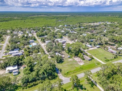 Can you imagine sitting on your rocking chair front porch on St. James Bay in Florida - for sale on GolfHomes.com, golf home, golf lot