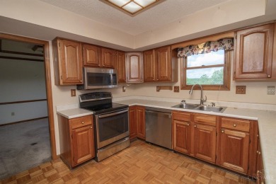 This spacious 2 story brick home boasts large rooms and plenty on Fairfield Greens-North Trace in Ohio - for sale on GolfHomes.com, golf home, golf lot