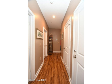Pretty 3-bedroom top floor end unit with lots of upgrades and on Crow Creek Golf Club in North Carolina - for sale on GolfHomes.com, golf home, golf lot