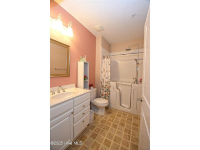 Pretty 3-bedroom top floor end unit with lots of upgrades and on Crow Creek Golf Club in North Carolina - for sale on GolfHomes.com, golf home, golf lot