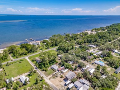 Can you imagine sitting on your rocking chair front porch on St. James Bay in Florida - for sale on GolfHomes.com, golf home, golf lot