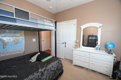 Pretty 3-bedroom top floor end unit with lots of upgrades and on Crow Creek Golf Club in North Carolina - for sale on GolfHomes.com, golf home, golf lot