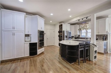 Welcome to this expansive and thoughtfully designed four-bedroom on Bent Tree Golf Course in Georgia - for sale on GolfHomes.com, golf home, golf lot