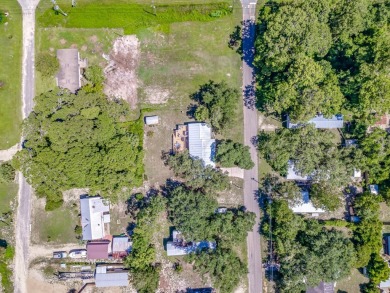 Can you imagine sitting on your rocking chair front porch on St. James Bay in Florida - for sale on GolfHomes.com, golf home, golf lot