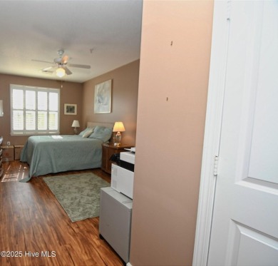 Pretty 3-bedroom top floor end unit with lots of upgrades and on Crow Creek Golf Club in North Carolina - for sale on GolfHomes.com, golf home, golf lot