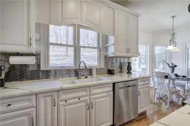 Welcome to this expansive and thoughtfully designed four-bedroom on Bent Tree Golf Course in Georgia - for sale on GolfHomes.com, golf home, golf lot