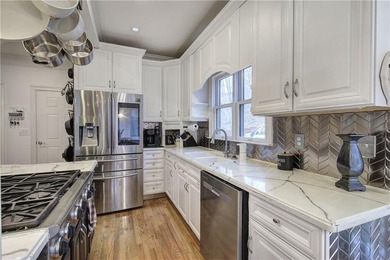 Welcome to this expansive and thoughtfully designed four-bedroom on Bent Tree Golf Course in Georgia - for sale on GolfHomes.com, golf home, golf lot