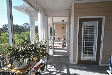 Pretty 3-bedroom top floor end unit with lots of upgrades and on Crow Creek Golf Club in North Carolina - for sale on GolfHomes.com, golf home, golf lot