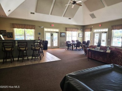 Pretty 3-bedroom top floor end unit with lots of upgrades and on Crow Creek Golf Club in North Carolina - for sale on GolfHomes.com, golf home, golf lot