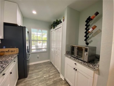 Adorably furnished, top floor, waterfront condominium in Deep on Deep Creek Golf Club in Florida - for sale on GolfHomes.com, golf home, golf lot