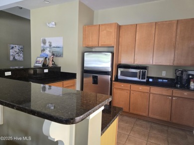 Pretty 3-bedroom top floor end unit with lots of upgrades and on Crow Creek Golf Club in North Carolina - for sale on GolfHomes.com, golf home, golf lot
