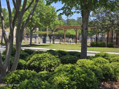 Pretty 3-bedroom top floor end unit with lots of upgrades and on Crow Creek Golf Club in North Carolina - for sale on GolfHomes.com, golf home, golf lot