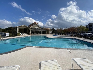 Pretty 3-bedroom top floor end unit with lots of upgrades and on Crow Creek Golf Club in North Carolina - for sale on GolfHomes.com, golf home, golf lot