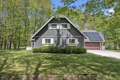 Welcome to your dream home with front-row views of the 5th hole on Canadian Lakes Country Club-The Highlands Course in Michigan - for sale on GolfHomes.com, golf home, golf lot