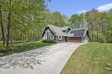 Welcome to your dream home with front-row views of the 5th hole on Canadian Lakes Country Club-The Highlands Course in Michigan - for sale on GolfHomes.com, golf home, golf lot