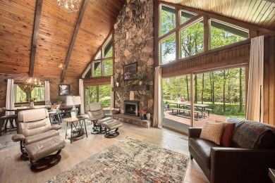 Welcome to your dream home with front-row views of the 5th hole on Canadian Lakes Country Club-The Highlands Course in Michigan - for sale on GolfHomes.com, golf home, golf lot