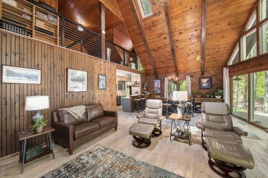 Welcome to your dream home with front-row views of the 5th hole on Canadian Lakes Country Club-The Highlands Course in Michigan - for sale on GolfHomes.com, golf home, golf lot