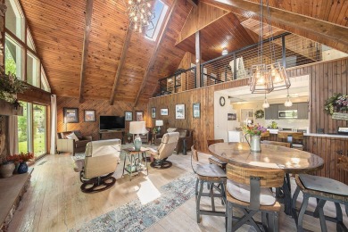 Welcome to your dream home with front-row views of the 5th hole on Canadian Lakes Country Club-The Highlands Course in Michigan - for sale on GolfHomes.com, golf home, golf lot