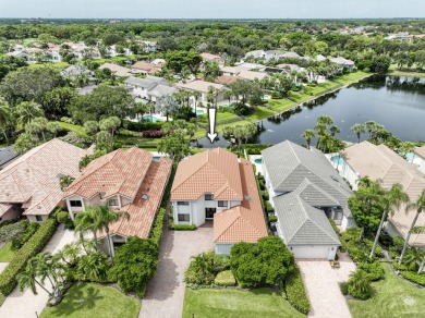 Serene water views frame this totally remodeled and well on Frenchmans Creek Country Club in Florida - for sale on GolfHomes.com, golf home, golf lot