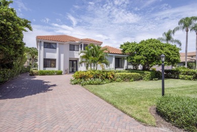 Serene water views frame this totally remodeled and well on Frenchmans Creek Country Club in Florida - for sale on GolfHomes.com, golf home, golf lot