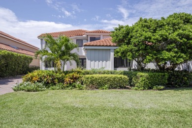 Serene water views frame this totally remodeled and well on Frenchmans Creek Country Club in Florida - for sale on GolfHomes.com, golf home, golf lot