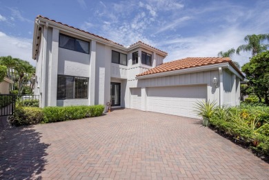 Serene water views frame this totally remodeled and well on Frenchmans Creek Country Club in Florida - for sale on GolfHomes.com, golf home, golf lot