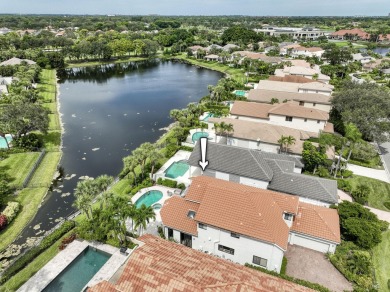 Serene water views frame this totally remodeled and well on Frenchmans Creek Country Club in Florida - for sale on GolfHomes.com, golf home, golf lot