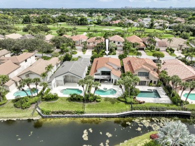 Serene water views frame this totally remodeled and well on Frenchmans Creek Country Club in Florida - for sale on GolfHomes.com, golf home, golf lot