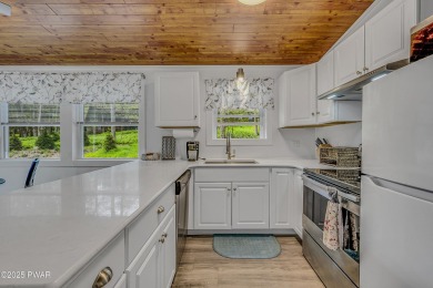 Enjoy the good life in Tanglwood Lakes at Lake Wallenpaupack on Paupack Hills Golf and Country Club in Pennsylvania - for sale on GolfHomes.com, golf home, golf lot