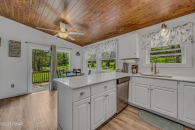Enjoy the good life in Tanglwood Lakes at Lake Wallenpaupack on Paupack Hills Golf and Country Club in Pennsylvania - for sale on GolfHomes.com, golf home, golf lot