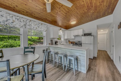 Enjoy the good life in Tanglwood Lakes at Lake Wallenpaupack on Paupack Hills Golf and Country Club in Pennsylvania - for sale on GolfHomes.com, golf home, golf lot